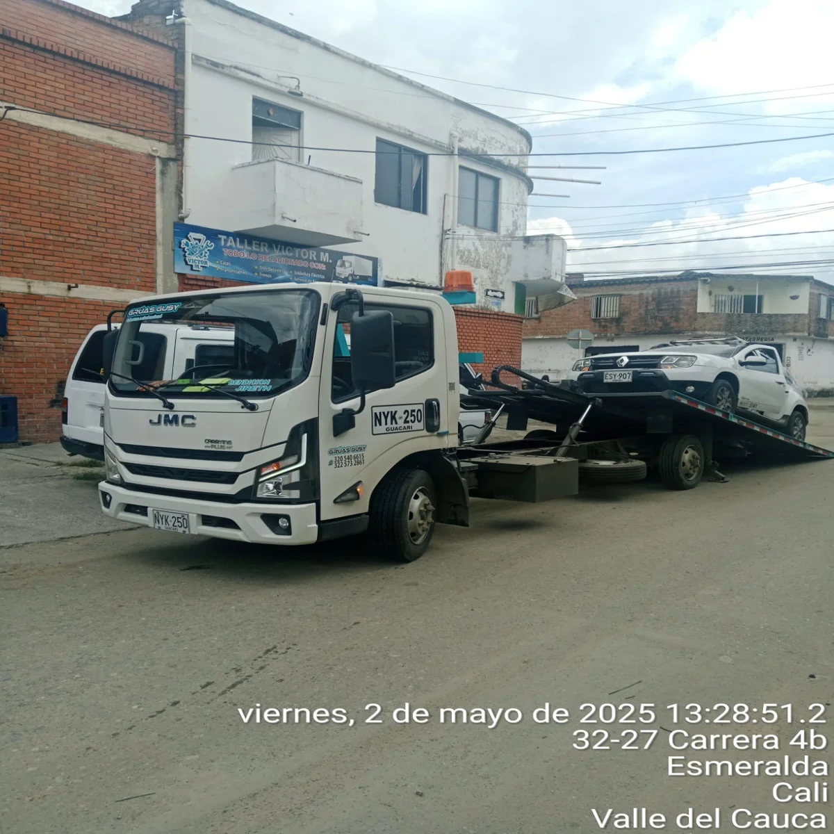 Grúa tipo planchón para carros en Cali